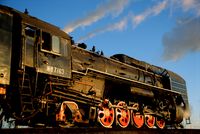 A QJ-class steam locomotive of the Jitong Railway waits at Daban, China. Seen on a Reisen mit Peter tour.